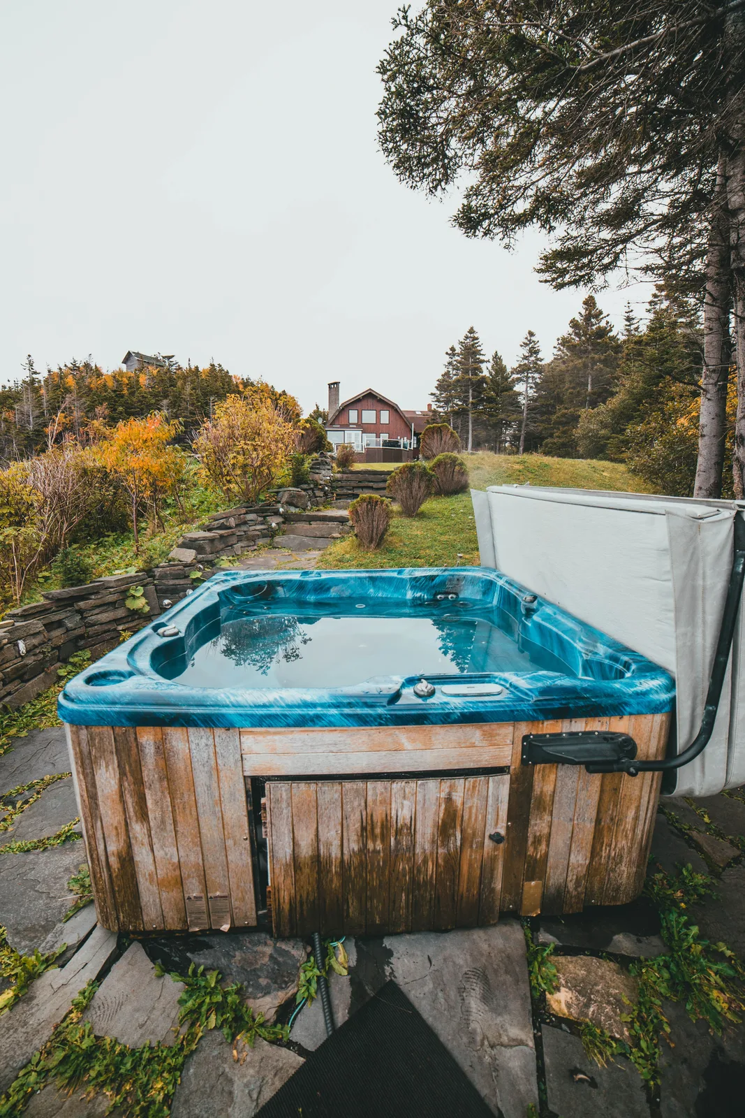 Backyard hot tub / spa, representative of a residential spa or pool/spa combo system